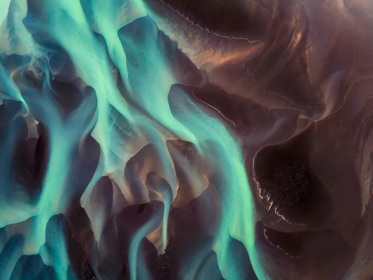 Swirling green ice seen from above.