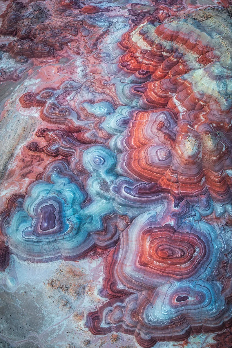 Aerial view of multicoloured rocks.